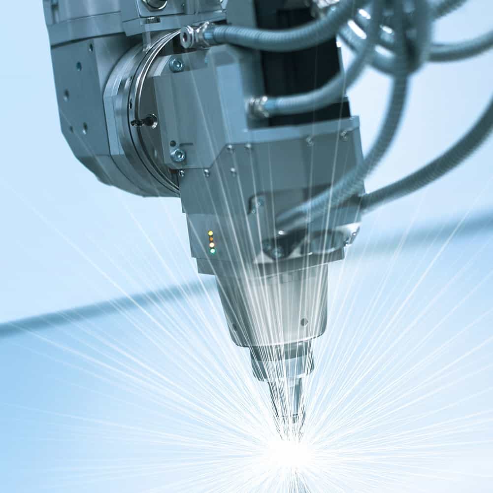 Industrial laser cutter with integrated chiller cooling system