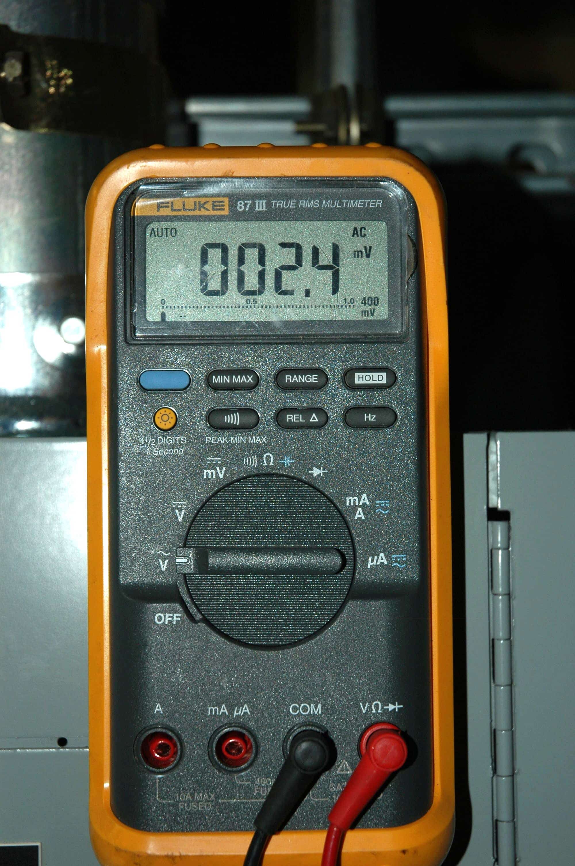 Fluke multimeter used for diagnosing electrical issues during industrial chiller maintenance and repair