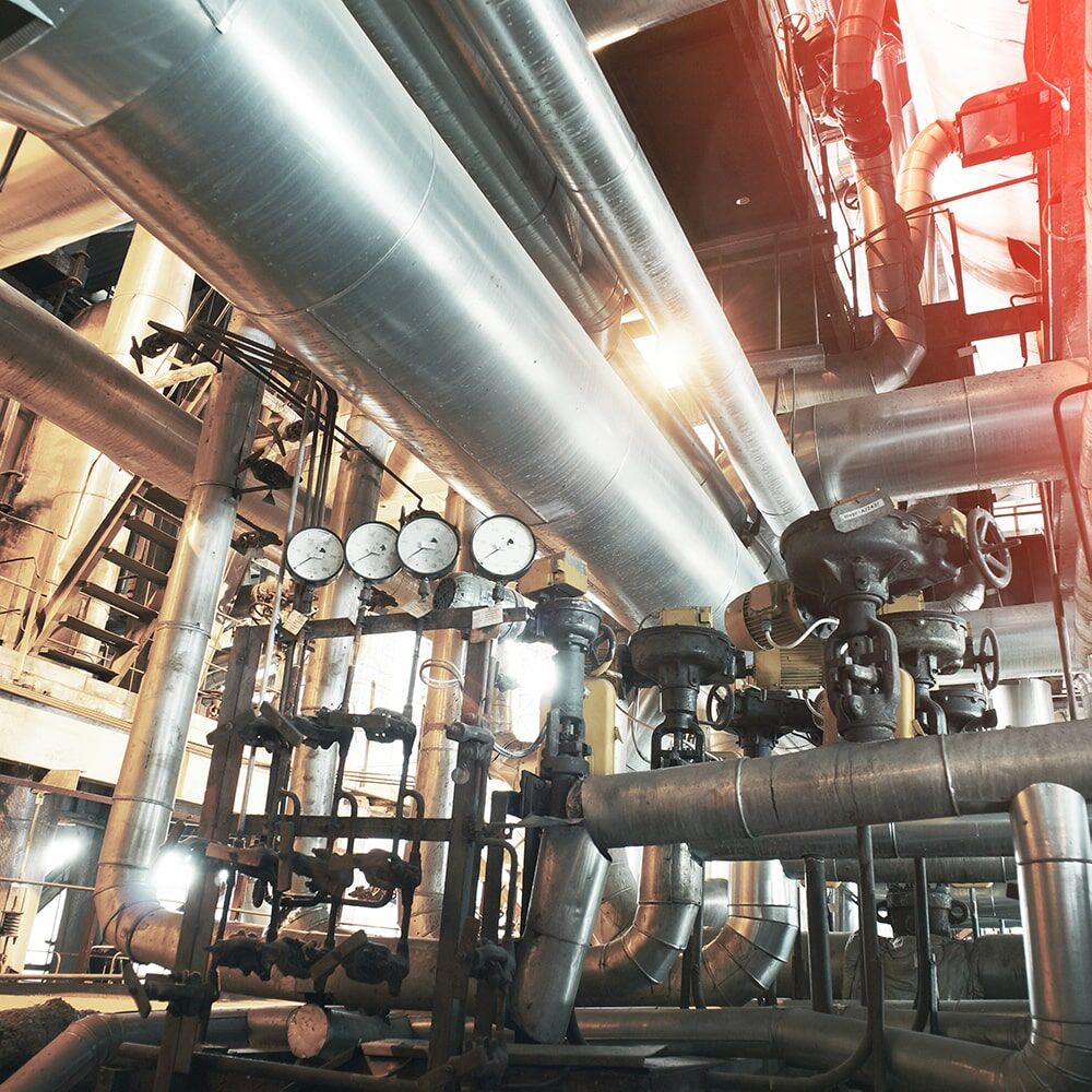 Glycol heating system used in industrial process cooling