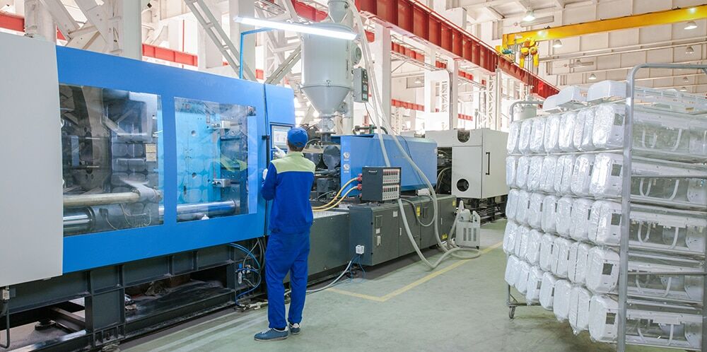 Plastic manufacturing facility using industrial process cooling systems