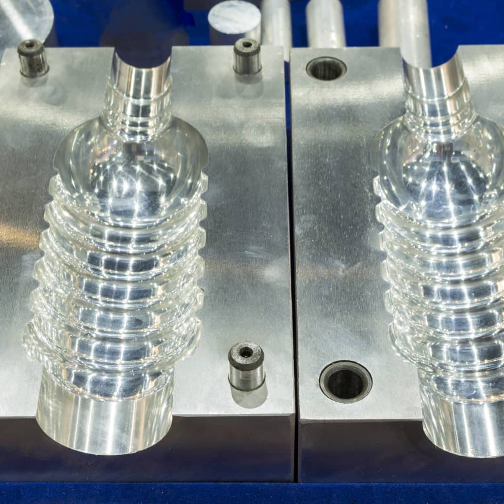 Plastic water bottle produced using injection molding with chiller-cooled molds