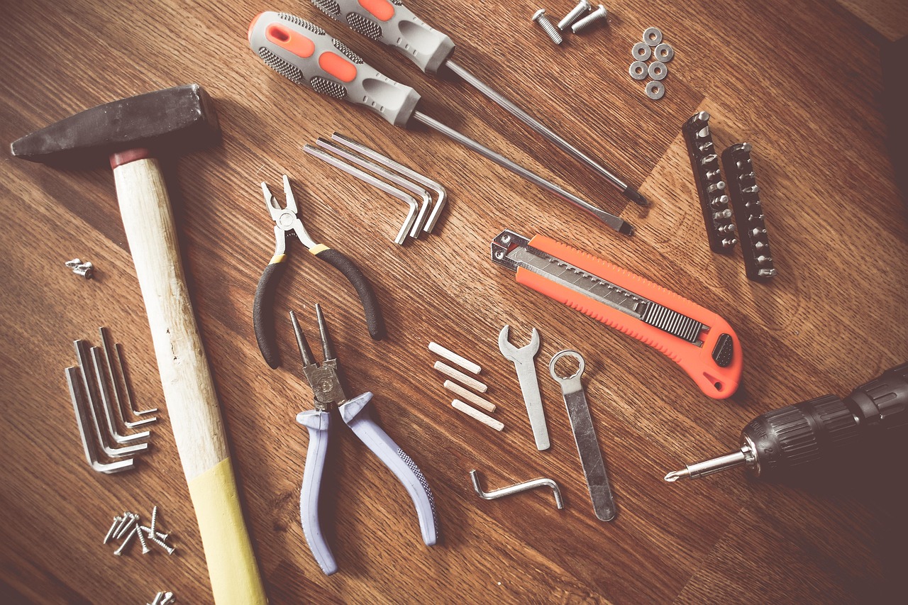 Maintenance tools organized on a workbench for industrial chiller repair and servicing