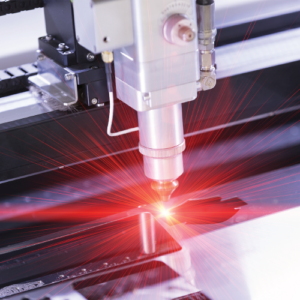 Laser cutting through metal